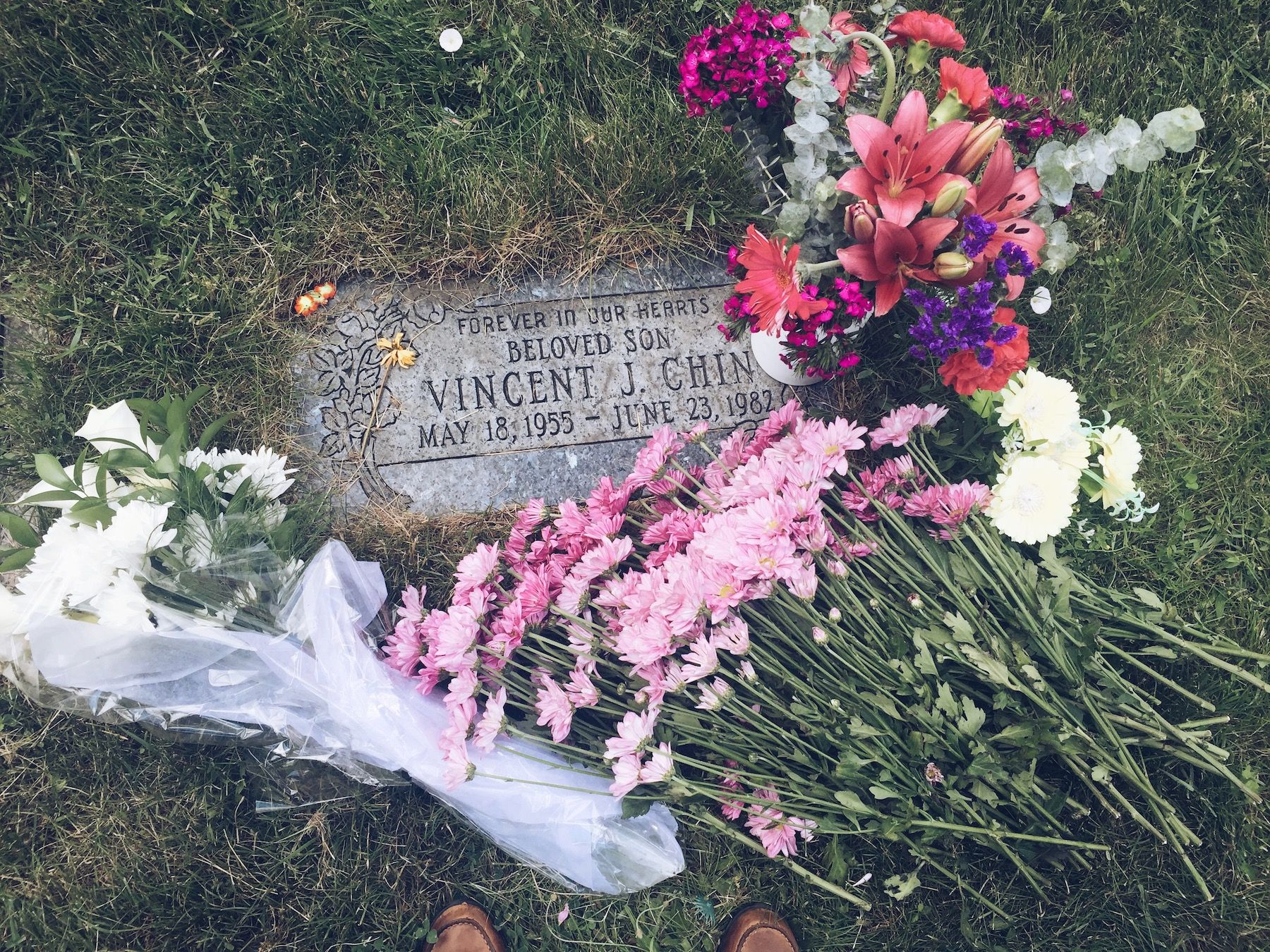 Vincent Chin's headstone. Pile of flowers