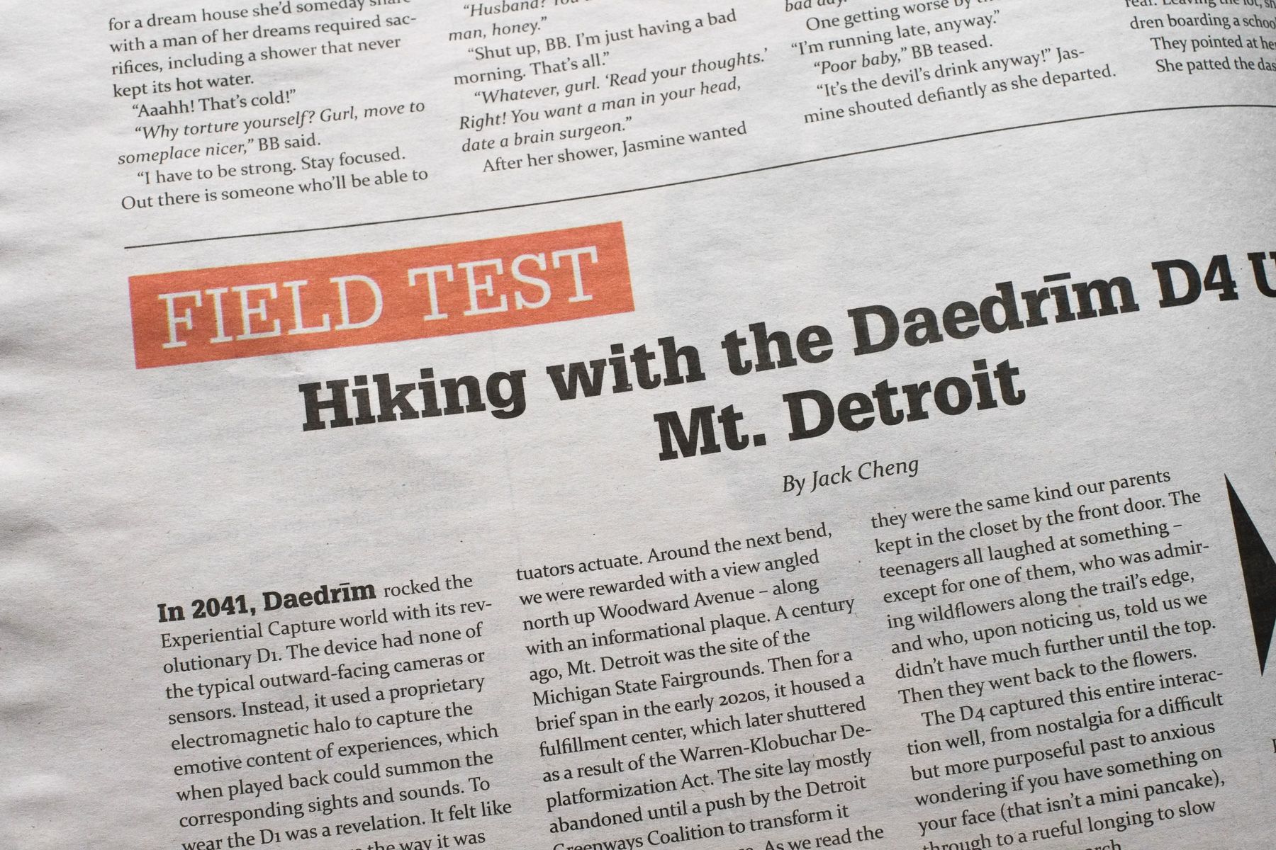 Close-up of orange “Field Test” design element above headline.