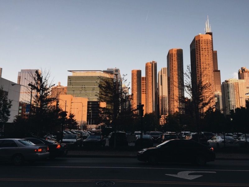 Magic hour apartment buildings, Willis Tower peaking from behind.