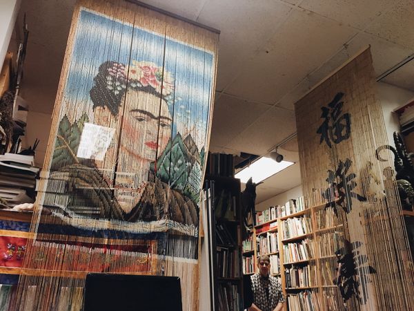 Back room bead curtains. Frida Kahlo, Chinese characters.