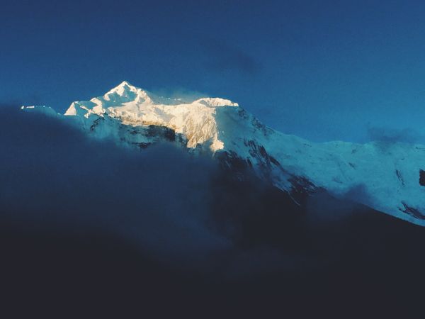 Snowy sun-peaked Annapurna II