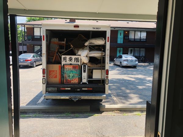 Filled U-Haul truck in parking lot